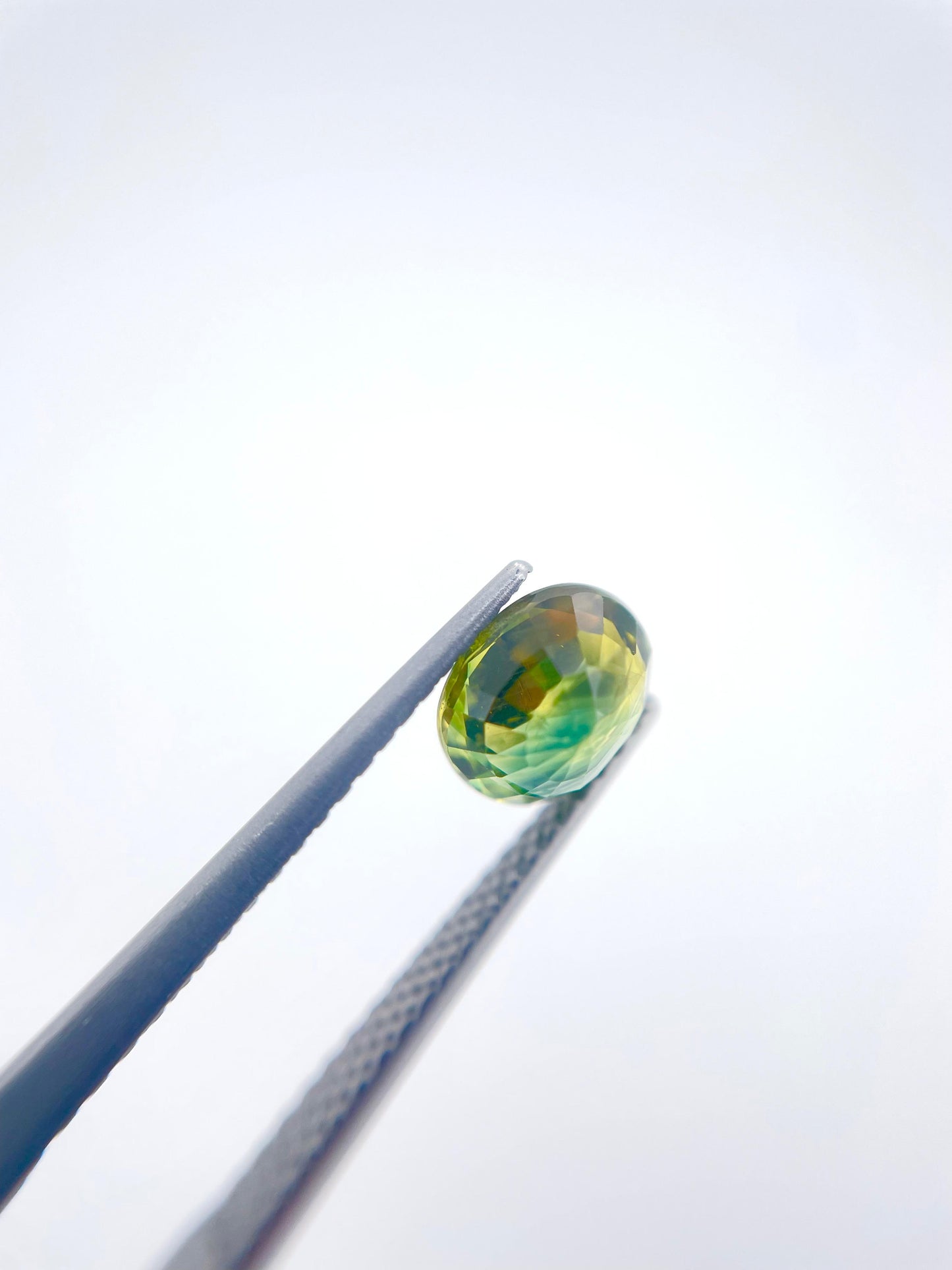 Saphire oval naturel bi-color jaune/bleu 1.43 ct