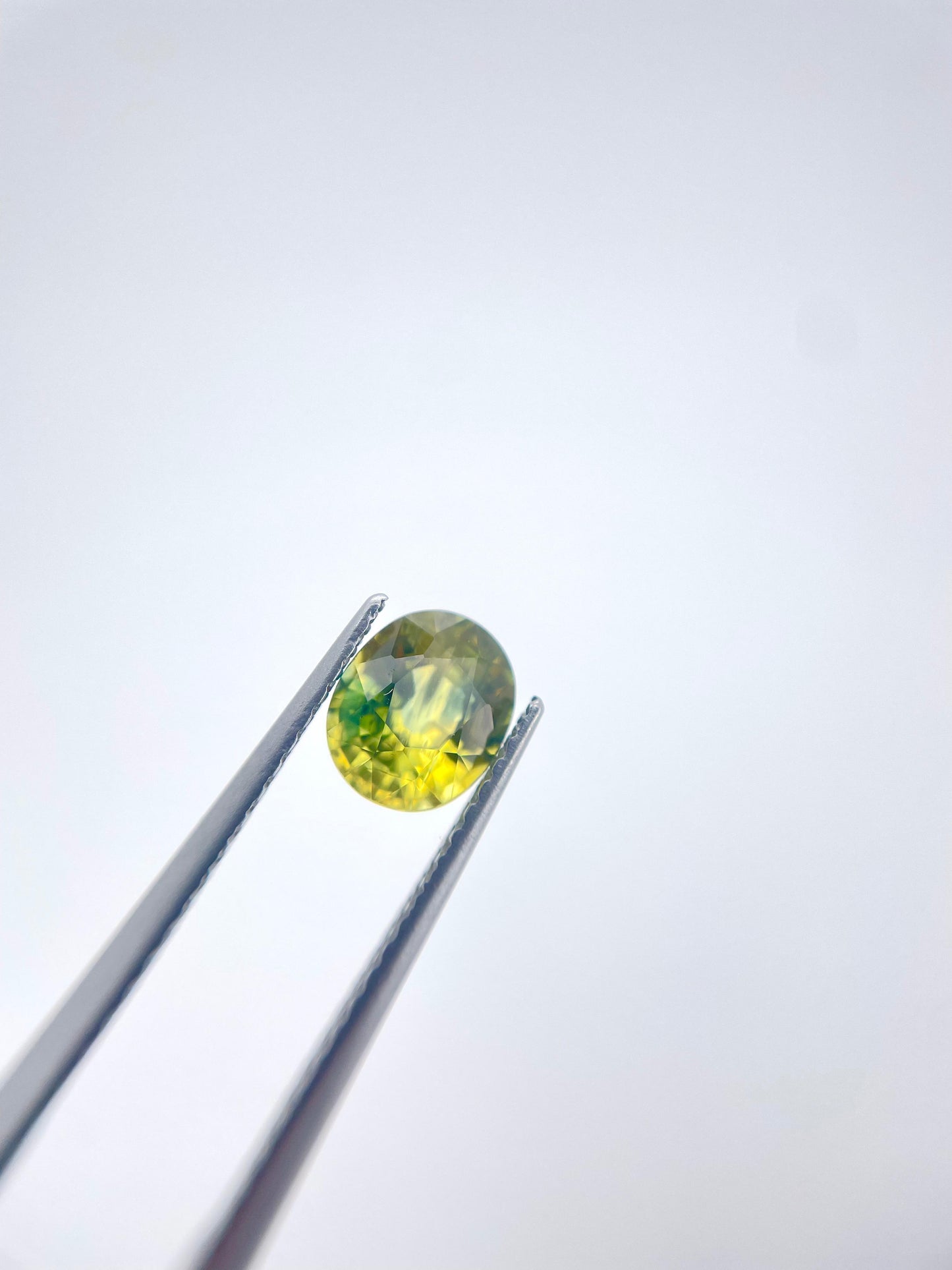 Saphire oval naturel bi-color jaune/bleu 1.43 ct